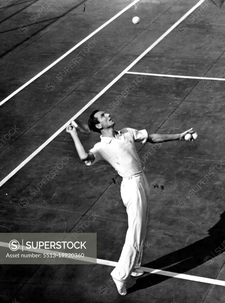 Perry Ousts Gledhill In Pro TennisDefending national professional Tennis champion Fred Perry (above) is shown serving to Keith Gledhill of Culver City in the Quarter-final match of the 1939 pro net title play at the Beverly Hills Tennis Club. Perry won by scores of 7-5, 5-7, 6-2. October 19, 1939. (Photo by ACME).