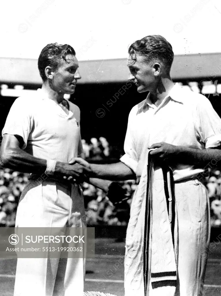 Perry Wins Men's Singles Championship At Wimbledon.Jack Grawford (Australia) congratulating Fred Perry on winning the men's Singles tennis championship at Wimbledon today. This is the first time since 1909 that an ***** has won the championship. July 06, 1934. (Photo by Keystone).