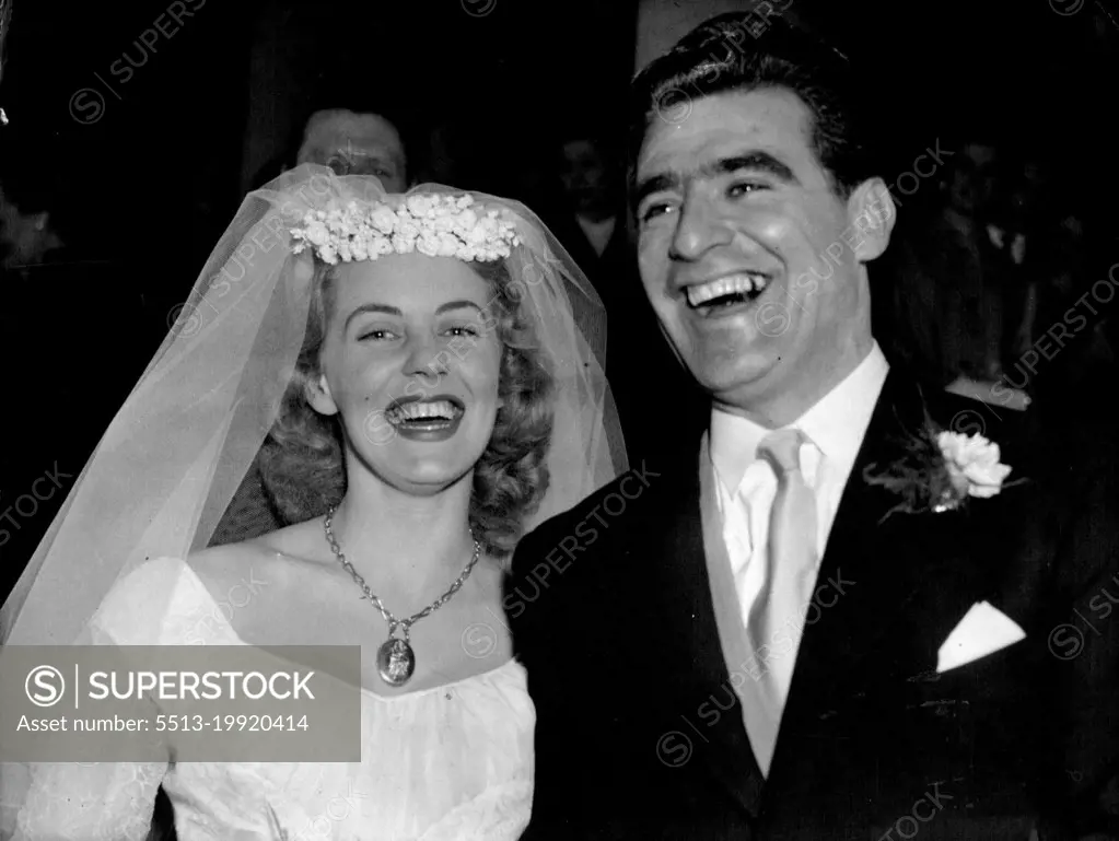 Champion Cyclist Weds:World Champion Sprint Cyclist Sidney Patterson, of Sydney, Australia, seen with his bride, the former Miss Jo-Ellen Ann Davis after their Easter Sunday wedding at St. Mary-Le-Strand, London. April 10, 1955. (Photo by Associated Press Photo).