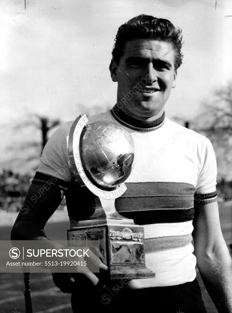 Champion of Champions: Syd Patterson holds the "Champion of Champions" trophy which he won in the international sprint race over 1,000 metres at the Good Friday meeting at London's Herne Hill, Apr. 7, 50? December 9, 1953. (Photo by Associated Press Photo).