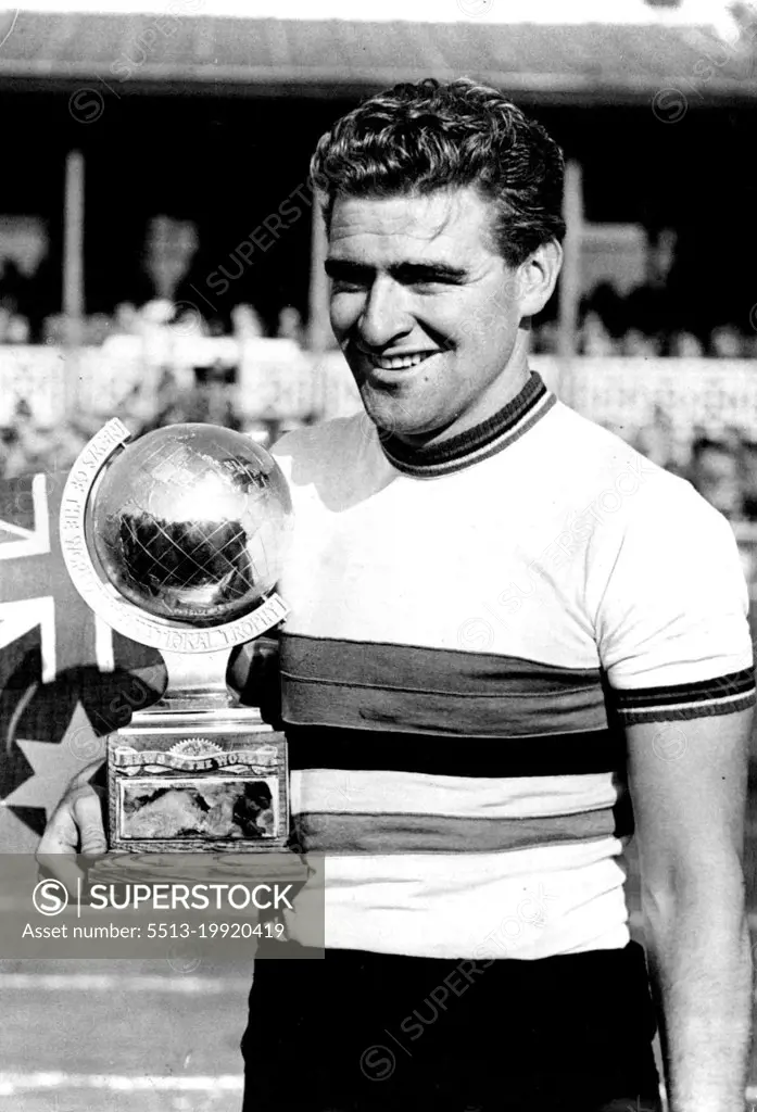 Cycling, The Champion of Champions:Sid Patterson, Australian World Amateur Sprint Champion, with his Trophy after winning the Champion of Champions race at Herne Hill track, London. April 7, 1950. (Photo by Sport & General Press Agency, Limited).