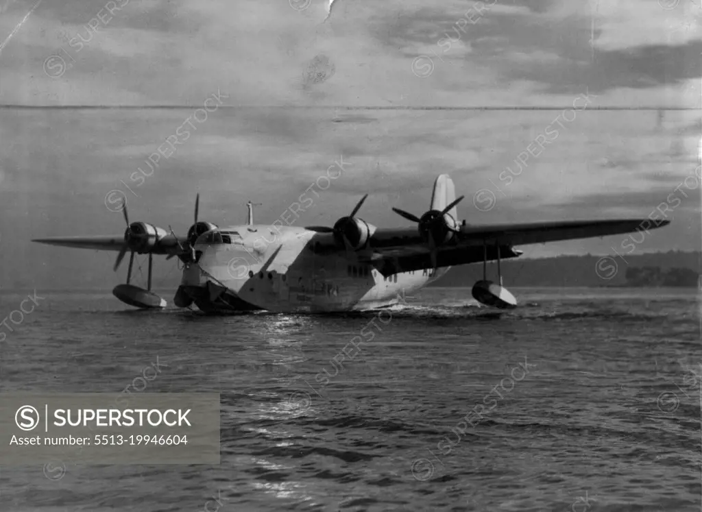 Qantas Empire Airway Flying Boat, "Cooee", taxis to the morning at Rose Bay. April 26, 1939. (Photo by Russell Roberts Pty. Ltd.).