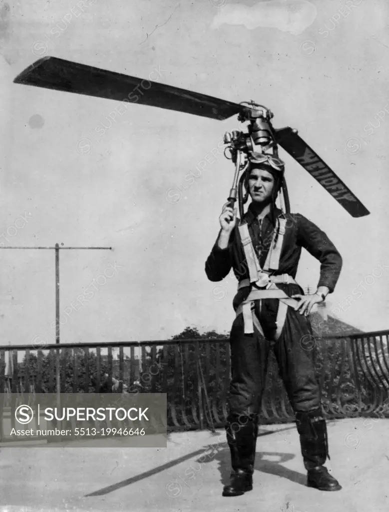 Everybody Can Wear His Own Autogyro, Take Off In Street -- Paul Baumgartl wearing the 'Heliofly'. The 'Heliofly', a device which, strapped to the body, enables the wearer to take off in the street, climb to an altitude of 3,000 feet and fly Baumgartl, a 28-year-old Viennese technician, after three years' experiment and trial. The apparatus consists of an air screw resembling an autogyro's, and a motor; total weight does not exceed 30 pounds. Baugartl says he is going to start mass production of the 'Heliofly' as soon as the Allied occupation authorities permit powered aviation in Australia. October 24, 1946.