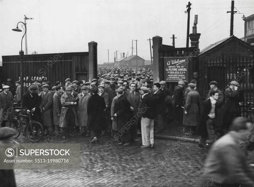 Back To Work -- And Now Too Many Dockers -- Dockers back to work at the Royal Albert Docks to-day.Forty-four Thousand dock strikers reported for duty today - but there was not work for all of them. At London; Southampton, Merseyside, Birkenhead and Hull all the men reported for work. There was a full resumption of work except at London, where a National Dock Labour Board spokesman said that there was a "surplus of labour" all over the docks. Of the 26,000 men who lied up outside the dock gates more than 2,000 found themselves without jobs when they got to the call stands. At the Royal Group about 1,050 men found themselves unemployed - about one-fifth of the pool strength. November 1, 1954. (Photo by Daily Mail Contract Pictures).
