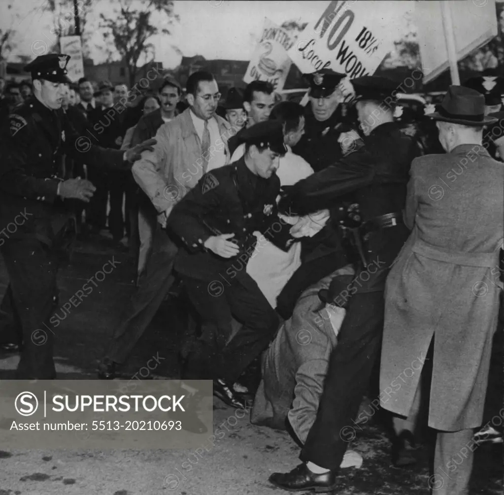 Violence At West Hartford Strike -- Police and strikers tangle as violence of breaks out at the Pratt-Whitney aircraft plant at West Hartford, Conn., 13. The disturbance started when persons described by company spokesmen.As workers sought to enter the plant by walking through picket lines. May 31, 1946. (Photo by Associated Press Photo).