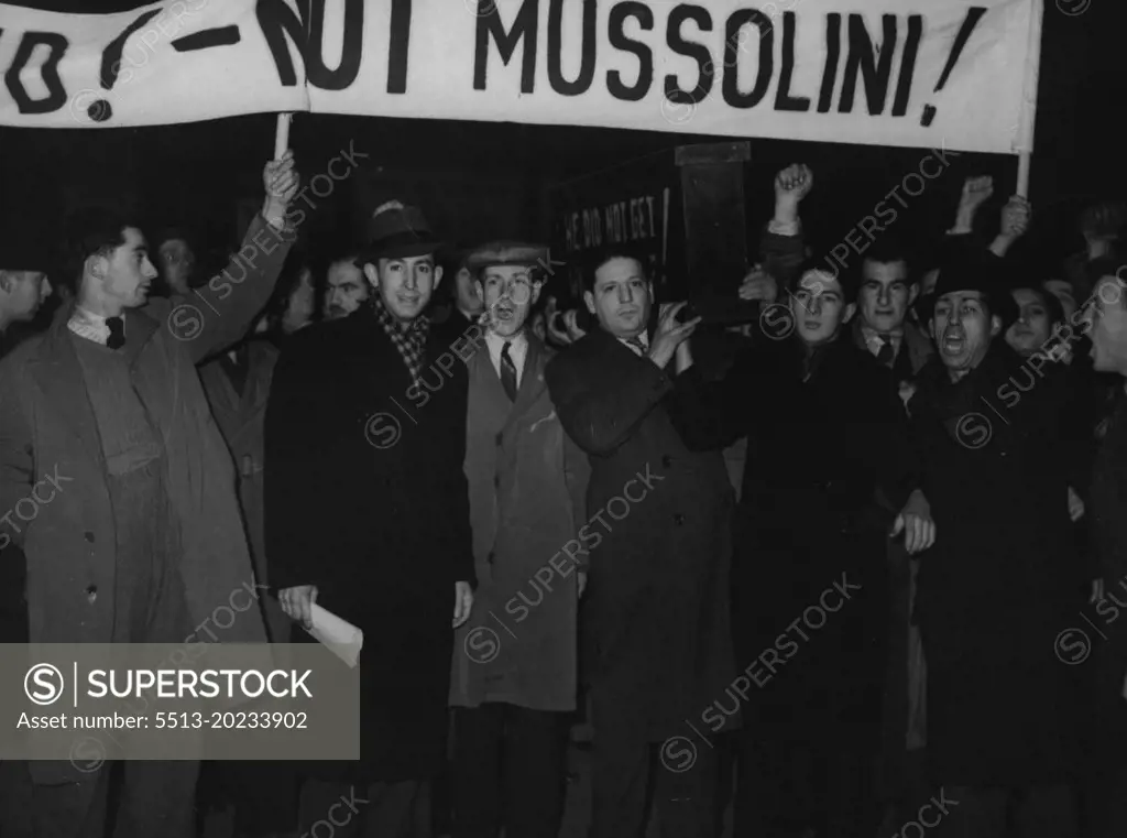 Premier Leaves For Rome - Unemployed stages a demonstration among the cheering crowds at Victoria station to-day as Mr. Chamberlain and Lord Halifax, the Foreign secretary, left on the first stage of their journey to Rome for talks with Mussolini,Demonstrator outside Victoria with the famous black coffin and banner "Appease the Unemployed, not Mussolini". January 10, 1939. (Photo by Sport & General Press Agency, Limited).