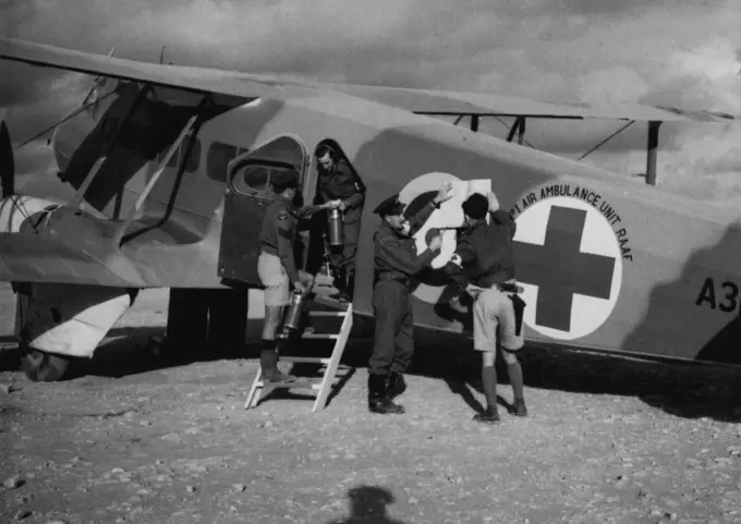 132 Aviation - Ambulance Planes (See Also: Mercy Flights, Hospital & Medical; Dr. M. Caldwell, Late, Dr. J. Flynn, Dr. A. Vickers). May 11, 1943. (Photo by A.I.F. Photograph).