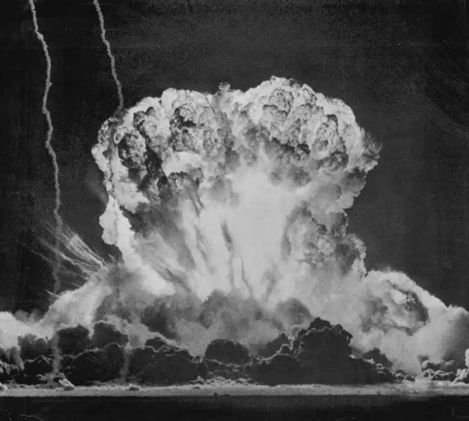 Atomic Fury -- The awesome violence of an atomic explosion is fully depicted in this picture of today's blast a moment after the AEC detonated an atomic "Device" at the top of a 300-foot steel tower. AP photographer Hal Filan made this picture with a 28-inch lens from news nob, seven miles away. March 17, 1953. (Photo by AP Wirephoto).