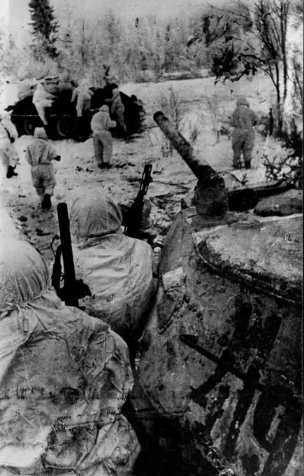 Great Soviet Winter Offensive 1943-44 -- Red Army tankborne troops are given the signal to advance and rush to their tanks. February 26, 1944. (Photo by Sport & General Press Agency, Limited).