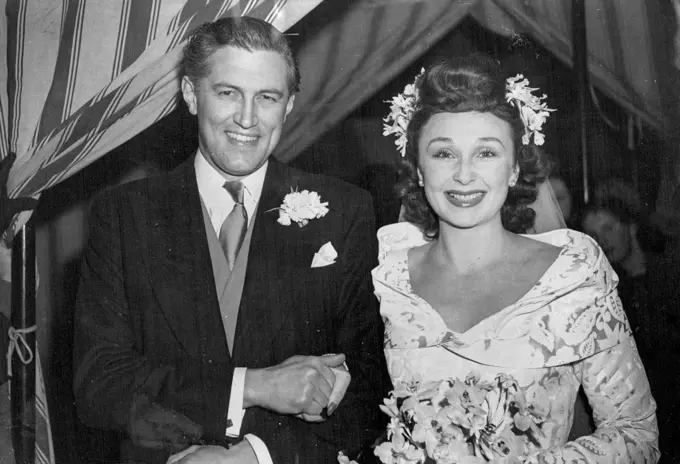 Wedding His For Googie And John -- The happy couple pictured as they left St. George's Hanover Square, to-day (Saturday). Film stars Googie Withes and John McCallum, who have played apposite ouch other in three recent films, were married to-day (Saturday) at St. George's, Hanover Square. Miss Withers in the only daughter of Captain P.C. Whithers C.I.E., C.B.E., R. I. N., and of Mrs. Withers, of Yateley, Hants; her bridegroom is oldest son of Mr. and Mrs J.N. McCallum, of Sydney, Australia. Jan