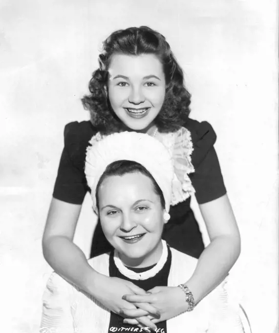 A portrait - of Jane Wither and her mother Mrs. Ruth Withers. Jane recently completed "Here First Beau," a Columbia picture. August 30, 1948.