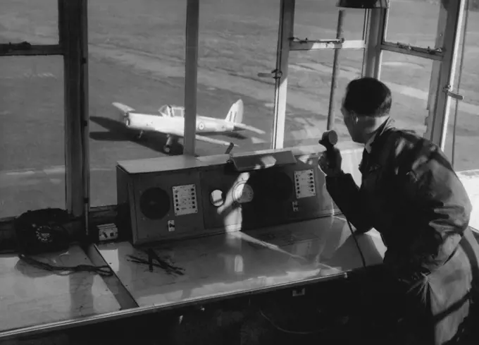 Aircraft Builders of Tomorrow Learn The Job -- A student, off for his first solo flight, taxis his plane past the control tower. April 01, 1954. (Photo by Roger Quilter, United Press Photo).