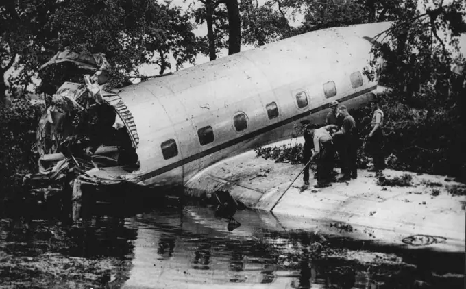 British Luxury Air Liner Crashes On Test Flight -- Part of wreckage of Tudor II Luxury air liner which dived to earth on a test flight near Woodford, Cheshire, England, August 23. Four men died, another was seriously injured and a sixth escaped unhurt. Tudor II was designed by Mr. Roy Chadwick (man who designed R.A.F. Lancaster Bomber) a director of A.V. Roe Ltd. builders of the air liner. Chadwick was killed in this crash. August 24, 1947. (Photo by Associated Press Photo).