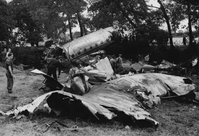 Britain's Biggest Land Plane Crashes On Test Flight -- A general view of the crashed Avro Tudor II, which broke its back on its test flight. When Britain's biggest land plane, the Avro TUDOR II crashed at Woodford Airfield, Cheshire yesterday, Mr. Roy Chadwick, one of Britain's greatest air designed and three other men were killed. The plane had Just taken off for a test flight, it rose fifty feet and "crashed like a stone". Mr. Chadwick was the designer of the Lancaster bomber. August 24, 1947.