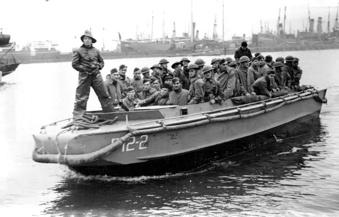 The American Forces Arrive in Iceland: Infantry troops come ashore in a tender from their transports on their arrival in Iceland to Garrison the Island with our own troops. May 24, 1942. (Photo by The Associated Press of Great Britain Ltd.).