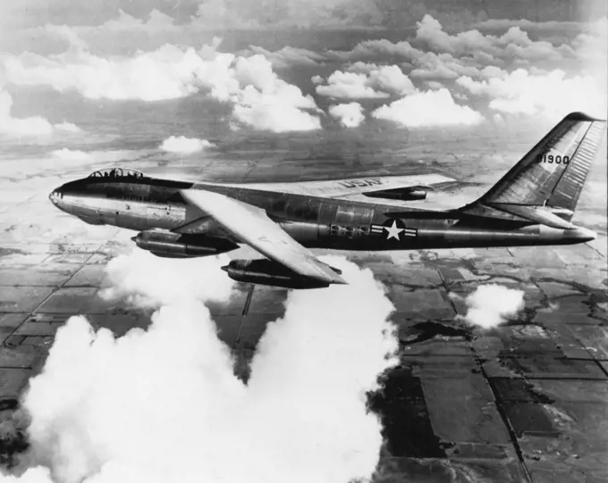 To Use Jet Bomber for Atomic Tests - The Air Force said today three types of bombers - one the B-47 all-jet medium bomber like this one soaring just above the clouds on a test flight -- will be used in the atomic tests in the Pacific. The B-47 is a six-jet engine powered, swept-wing plane in the "600-mile-per-hour speed class." March 21, 1951. (Photo by AP Wirephoto).