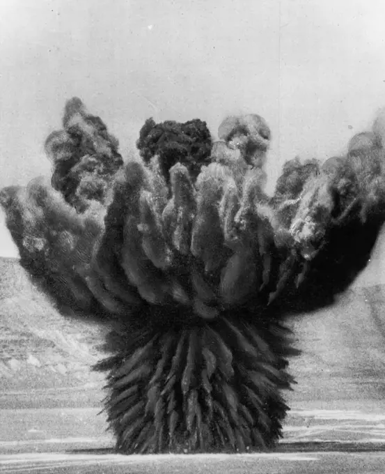 Patterned By Huge TNT Blast -- The earth shoots skyward in this unusual pattern, May 229 as Army engineers detonate 160 tons of TNT in the most powerful non-atomic explosion in history on desert of western Utah. May 28, 1951. (Photo by AP Wirephoto).