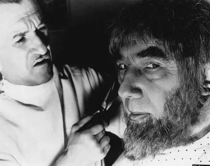 "Son of Frankenstein" -- Bela Lugosi, known for his great characterization in "Dracula," undergoes the finishing touches of the makeup he wears in "Son of Frankenstein," at the hands of Jack Pierce, Universal's head makeup man. September 25, 1952. (Photo by Universal).;"Son of Frankenstein" -- Bela Lugosi, known for his great characterization in "Dracula," undergoes the finishing touches of the makeup he wears in "Son of Frankenstein," at the hands of Jack Pierce, Universal's head makeup man.