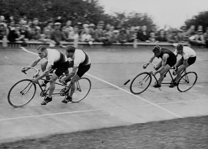 German Riders' Great Win -- Richter and Merkens leading Sibbit and Horn, during the race. Famous German cyclists, Albert Richter the world's amateur champion and Tony Merkens, were successful against the English riders J.E. Sibbit, the national sprint champion and D.S. Horn, N.C.U.26 miles title holder, at the meeting of cycling champions at Herne Hill. The two continental riders beat the Englishmen in a tandem match over two laps (1,006 yds) by half-a-dozen inches. October 24, 1932. (Photo by