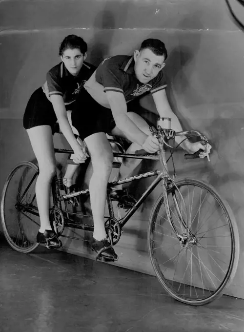 Joyce Barry and "Speed" Morgan Tandem-Cycle riders. May 30, 1935. sports, sport, athlete, athletic, 