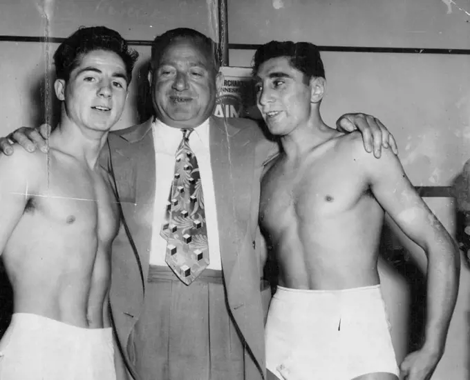 Jack "King" Solomons, the ***** given encouragement to both Scotland Peter Keenan world champion Vic Toweel after the weigh-in of their ***** scrap in Johannesburg last January. Keenan last ***** over the 15 rounds. March 4, 1953.