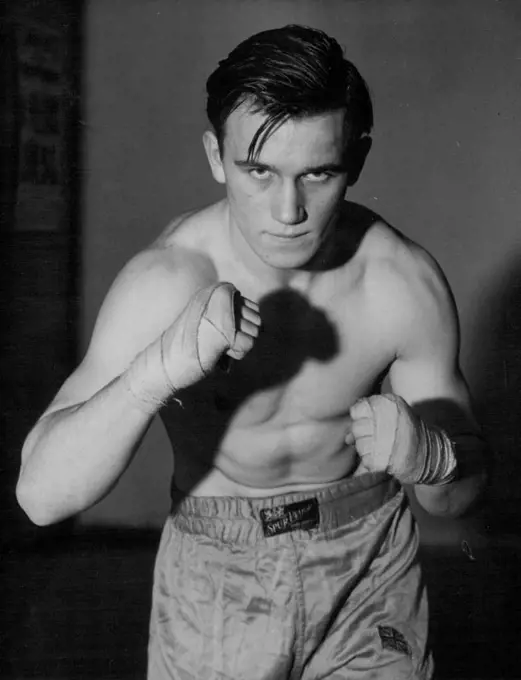 At 16 He's A Knock-Out -- A new picture of Danny Sewell, the sixteen-year-old heavyweight school boy boxer. Danny has already taken part in two professional contests and on each occasion he knocked out his opponent in the first round. January 27, 1947. (Photo by Reuterphoto)