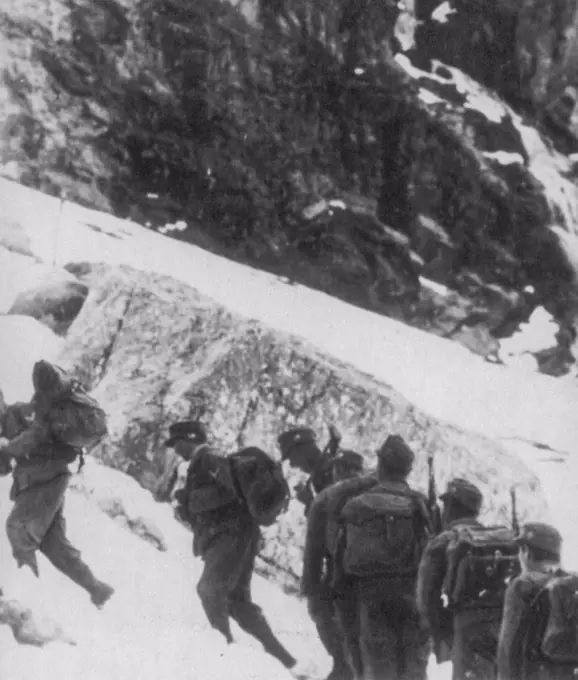 When Nazis Were In The Caucasus -- These soldiers are identified as German mountaineers on an observation patrol in the Caucasus mountains of Russia. Since this photo was made Russian forces have recaptured most of the Caucasus territory taken by the Germans. This photo reached the U.S. by way of London. February 7, 1943. (Photo by AP Wirephoto). 
