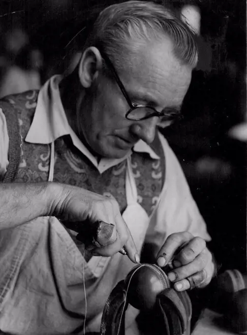 At the request of English captain Len Hutton, a Melbourne firm recently sent six handsewn cricket balls to him in Perth for practice purposes. Mr. C. Jones making them. He has been handsewing cricket balls for 30 years. An 5 English critic recently complained the English team had to use three different kinds of balls, the handsewn being reserved only for Tests. October 27, 1954. 