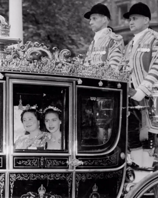 Queen Mother And Princess Drive To Abbey. Queen Elizabeth the Queen Mother, with Princess Margaret, driving along Northumberland Avenue in the Glass Coach to Westminster Abbey for the Coronation ceremony. June 2, 1953. (Photo by United Press Photo).