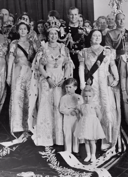 The Queen with her Family After The Coronation The radiant Queen photographed with her family in the Throne Room of Buckingham Palace after the Coronation seen in their magnificent Robes and dress are (left to right) H.R.H. Princess Margaret; H.M. Queen Elizabeth II; Mother; and (standing in front) apparently a little overawed by the splendour around them are the Queen's children, T.R.H. Prince Charles Duke of Cornwall and Princess Anne. June 02, 1953. (Photo by Fox Photos).