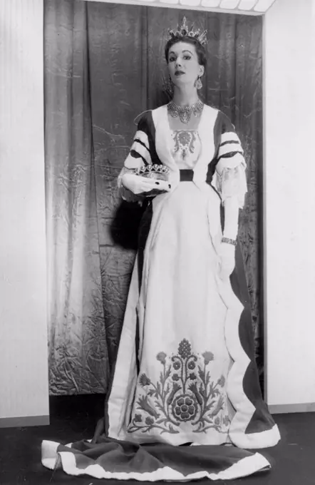 Coronation Glamour -- This lovely Coronation robe - a copy of a Viscountess's robe - was shown in the Spring Collection of the Moygashel fashion group at London's Dorchester Hotel. November 17, 1952. (Photo by Planet News Ltd.).
