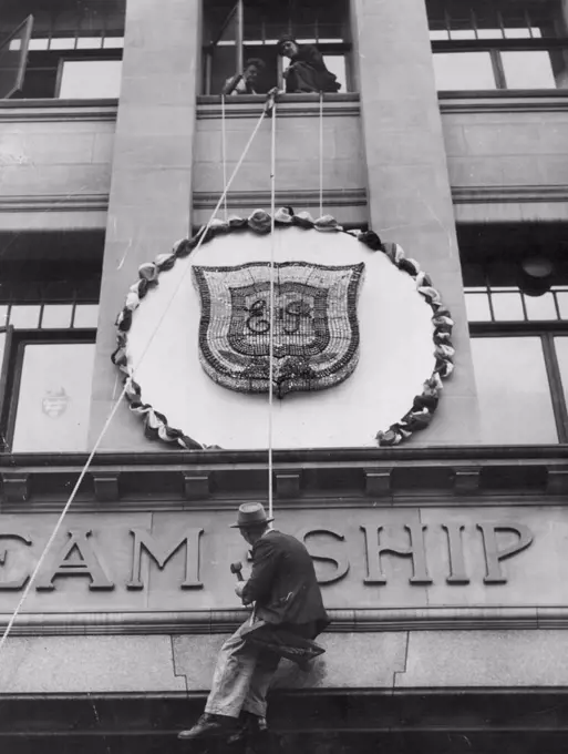 The 4000-piece crystal Coronation cipher on the front of the Union Steamship Co. in William Street was first used to decorate the company's offices for Queen Victoria's Jubilee in 1897. June 3, 1953.