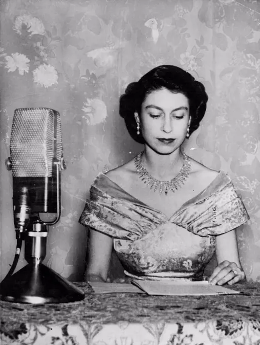 Queen ***** At Christmas -- Her Majesty the Queen at the mircorphone. Following the tradition by her grandfather and maintained by King ***** is to broadcast at a Christmas ***** from Sandringham on the afternoon *****. March 17, 1953.