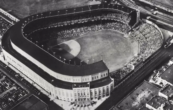 Series Crowd Sets A Record -- An Air view of Yankee Stadium during the World series opener today in which the Yanks defeated the Dodgers, 3 to 2. Official paid attendance was announced as 68,540 and total receipts as $265,396 both new records for a World Series Game. October 01, 1941. (Photo by AP Wirephoto).