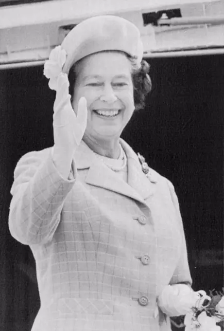 Farewell To Canada -- The Queen smiles as she waves farewell from the ramp of the Royal Air Force jet that will take her from Winnipeg to Lexington, Kentucky after completing a two week visit to Canada, Sunday. October 07, 1984. (Photo by CP Laserphoto).