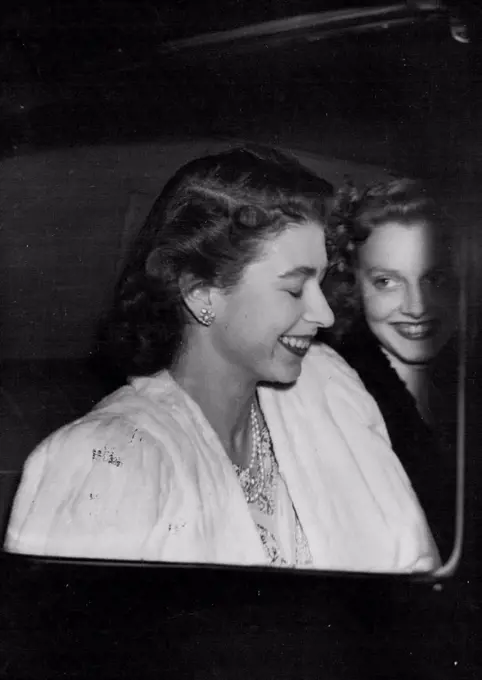 The Happy Princess - A smiling picture taken tonight, Wednesday, as H.R.H. Princess Elizabeth left the Dorchester Hotel, London. All the world is waiting to read the engagement notice, which is to be published tomorrow morning Thursday, of Princess Elizabeth to Lieut. Philip Mountbatten to which the King has given his consent. July 9, 1947.