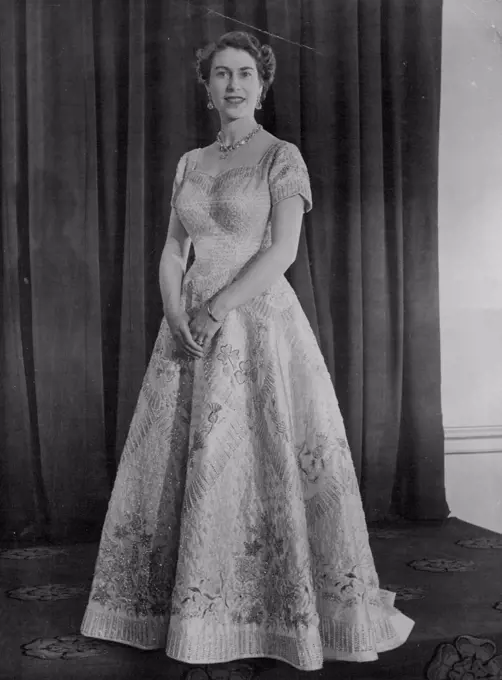 The Queen In The Coronation Gown A new portrait of the Queen, wearing the magnificent gown designed by Norman Hartnell for her Coronation. The picture was made at Buckingham palace when the Queen returned from the Abbey ceremony. June 3, 1953. (Photo by Reuterphoto).