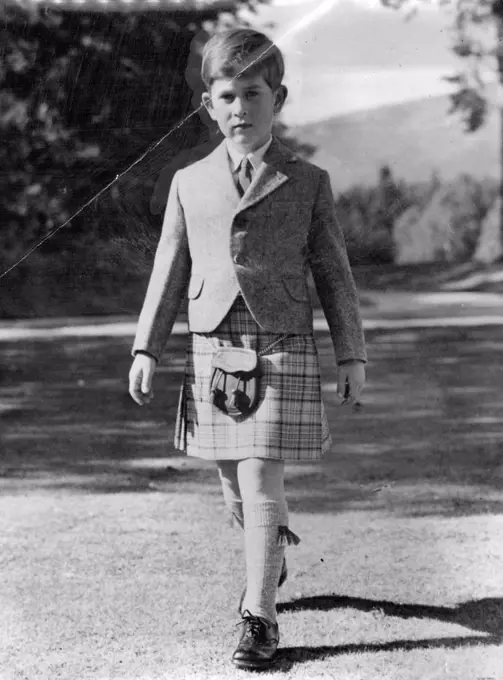 Prince Charles Is Seven - Seven years old today (Monday), Prince Charles looks a sturdy figure striding through the grounds of Balmoral Castle, Scotland, in a kilt of the Balmoral tartan (restricted to members of the Royal Family). He was born on November 14, 1948 at Buckingham Palace, London. November 11, 1955. (Photo by Reuterphoto).