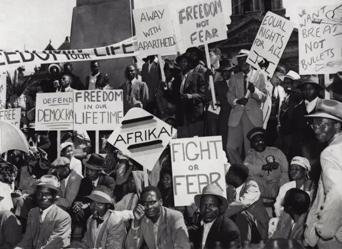 Peoples Protest in Cape Town.Photo Shows : A section of the crowd with their banners during the demonstrations in Cape Town.A big demonstration of people was held in Cape Town under the auspices of the African National Congress, the Franchise Action Council and the Cape Indian Assembly.The Demonstration was in Protest against the new measures of the Malan Government and the Apartheid laws in general. February 24, 1953. (Photo by Sports And General Press Agency Ltd)