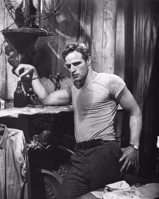 Marlon Brando, re-creates on the screen, his great triumph as Kowlaski, who bullied and tore at Blanche's (Vivian Leigh) neurotic self in Tennessee Williams Pulitzer prize winner, "A Streetcar Named Desire".A Streetcar Named Desire/Marlon Brando portrays Stanley Kowalski in the 1951 production of the Tennessee Williams play.More of the Same : Greer Garson's description of Marlon Brando: "He enters a room with all the unobstrusiveness of a guided missile". October 29, 1954.