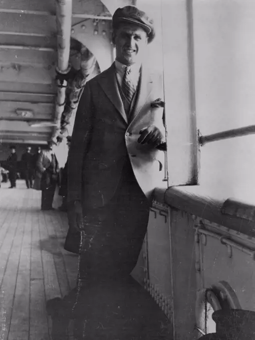 Phil Scott Home - Phil Scott photographed on board in mid-Atlantic during the *****.Phil Scott, the British heavyweight champion, arrived from America in the Cunard liner "Berengaria" today. April 15, 1930. (Photo by London News Agency Photo Ltd.).