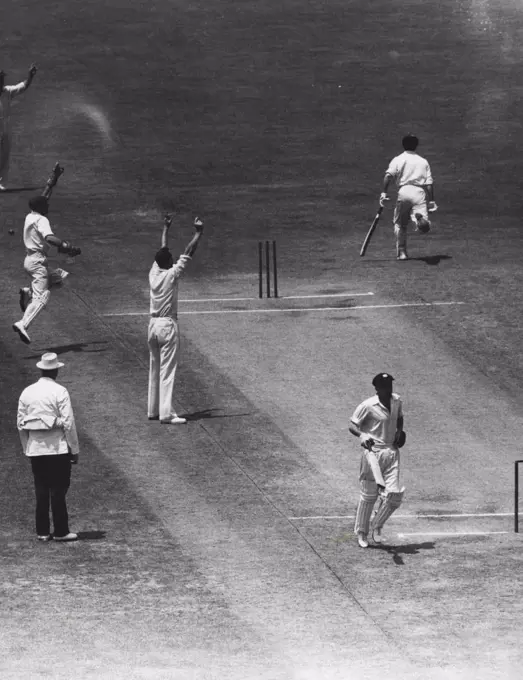 Victorian opening batsman K. Meuleman (back to camera) run out for one in the Sheffield Shield match against NSW yesterday. A. Davidson's quick return hit the stumps. January 03, 1950.