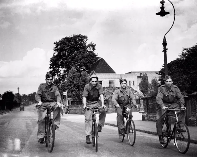 Italians Help In Britain.A party of "Co-operatives" after finishing a day's work are seen enjoying the beauty of the English countryside on cycles.More than 60,000 Italian Prisoners of War in this country have taken advantage of the ***** Government's invitation to become ***** in the common war effort.***** "Co-operatives", as they are now played, are formed into units organised ***** by Italian officers and N.C.O.'s and are not permitted to talk with members of the public, visit private buses, if invited to do so, and visit ***** at the discretion of their O.C., but they not enter public houses or ***** public conveyances, expect on duty. August 30, 1944. (Photo by Pix Photos Ltd.)
