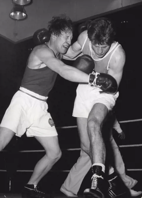 Getting It In  The Neck - Punkten (left) and Nitzschke, both from behind the iron curtain, Hammer each other in their Middleweight contest in the European boxing championships now being held in Berlin.Both boxers seem unable to look each other in the face and if Punkten doesn't open his eyes he'll find himself drawn onto a lovely left. May 30, 1955. (Photo by Paul Popper Photo).