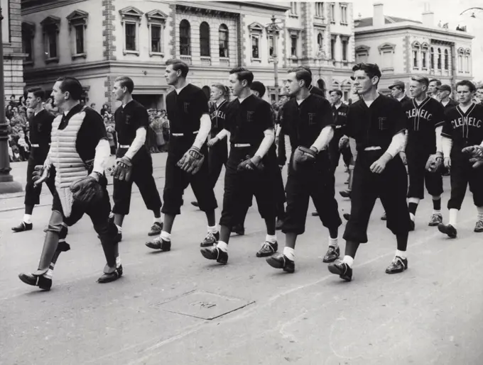 News Limited. Adelaide Jubilee procession -- East Torrens and Glenelg baseballers marching in the procession. May 17, 1951. 