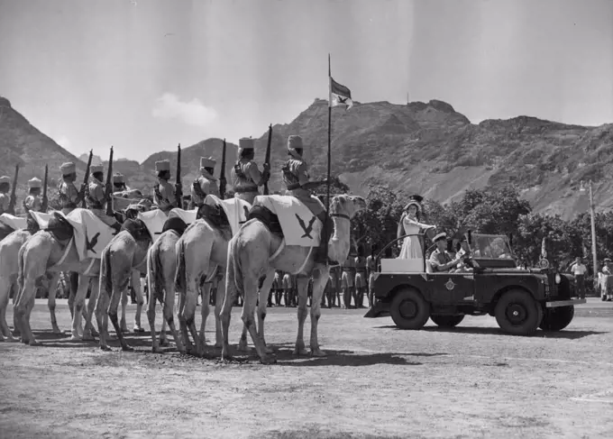 Royal Visit To Aden - Queen Inspects Aden Camel Corps -- H.M. The Queen, accompanied by H.R.H. The Duke of Edinburgh, seen inspecting the Camel Corps of the Aden Protectorate Levies from her. Land Rover, during a military display which took place in Crescent Gardens shortly after the Royal Couple arrived in Aden yesterday. April 28, 1954. (Photo by Fox Photos).