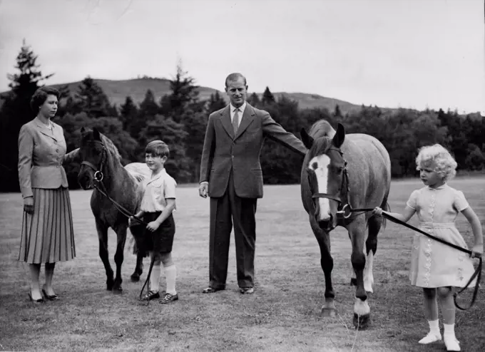 Royal Family At BalmoralQueen Elizabeth, the Duke of Edinburgh, and the children, Prince Charles and Princess Anne, exercise the ponies in the grounds of Balimoral Castle during the Royal Family's summer holiday, August 1955Prince Charles holds "William" and Princess Anne holds "Greensleeves."Balmoral Castle, the private property of the sovereign, on deside in West Aberdeenshire, Scotland, was Queen Victoria's favourite residence. Prince Albert bought the 11,000-Acre estate in 1852 for £ 31,500 and the Castle was rebuilt three years later. September 26, 1955. (Photo by James Reid, Associated Press Photo).