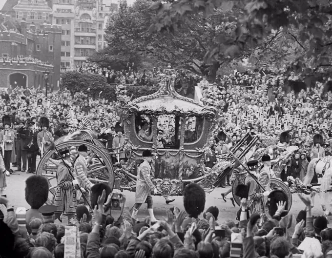 The Coronation - The Queen in the Coronation Coach passing St. James Palace.London was a city of crowds and of pageantry for the coronation of Queen Elizabeth II to-day. June 02, 1953. (Photo by Associated Newspapers).