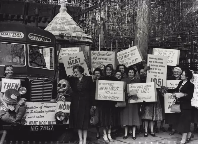 British Housewives Protest At Meat RationA deputation of British housewives arriving at the House of Commons today to protest to members of Parliament about the meagre meat ration of 8d per head per week. They come by lorry bearing "figureheads" showing comparisons in the meat rations "then and  now" and carried placards, some in rhyme, demonstrating against the recent meat ration cuts. February 07, 1951. (Photo by Paul Popper Ltd.).