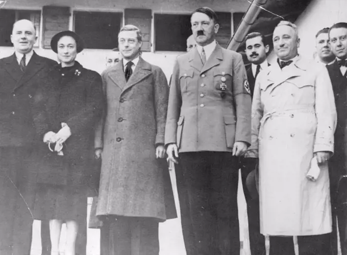 Photo Shows:- The Duke and Duchess of Windsor Photo graphed with Herr Hitler outside Der Fuehrer's mountain retreat. On right of Hitler is Dr. Ley, Leader of the German Labor Front. Duke and Duchess of Windsor Visit Hitler Two - Hour Talk at his Mountain Retreat:The Duke and Duchess of Windsor yesterday visited Hitler in his mountain home at Berchtesgaden. They took him tea with him and talked with him for two hours: After their arrival at Berchtesgaden station the visitors first drove to Koenigsee, Bavaria's most beautiful mountain lake. October 23, 1937. (Photo by The International Graphic Press Ltd).